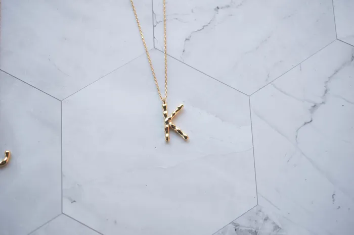 Dreamlandgt Earrings Collar Letra bao de oro Dreamlandgt Earrings Collar Letra bao de oro