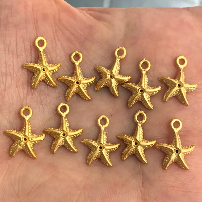 Earrings Peppy Beads 24Kt Matte Gold Plated Starfish Charms 10 Pieces in a pack Earrings Peppy Beads 24Kt Matte Gold Plated Starfish Charms 10 Pieces in a pack