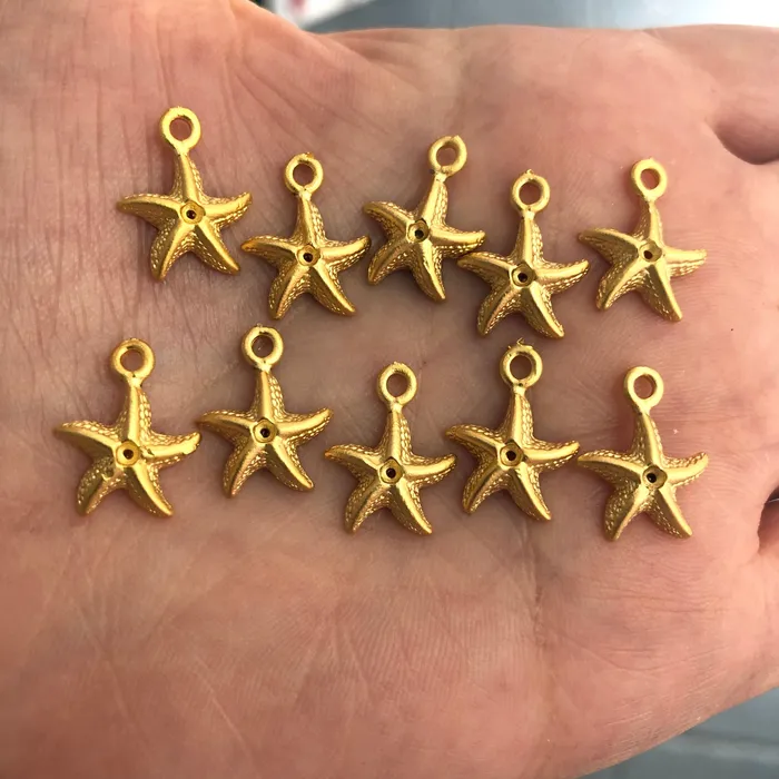 Earrings Peppy Beads 24Kt Matte Gold Plated Starfish Charms 10 Pieces in a pack Earrings Peppy Beads 24Kt Matte Gold Plated Starfish Charms 10 Pieces in a pack
