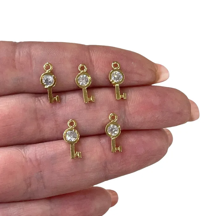 Peppy Beads 24Kt Shiny Gold Plated Key with Cubic Zirconia Charms 5 Pcs in a Pack Earrings Peppy Beads 24Kt Shiny Gold Plated Key with Cubic Zirconia Charms 5 Pcs in a Pack Earrings