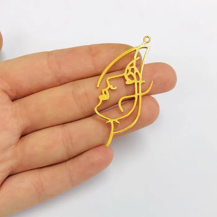 Peppy Beads Earrings Face Outline 24Kt Gold Plated Brass Charms Abstract Face Pendants 2 pcs in a pack Peppy Beads Earrings Face Outline 24Kt Gold Plated Brass Charms Abstract Face Pendants 2 pcs in a pack