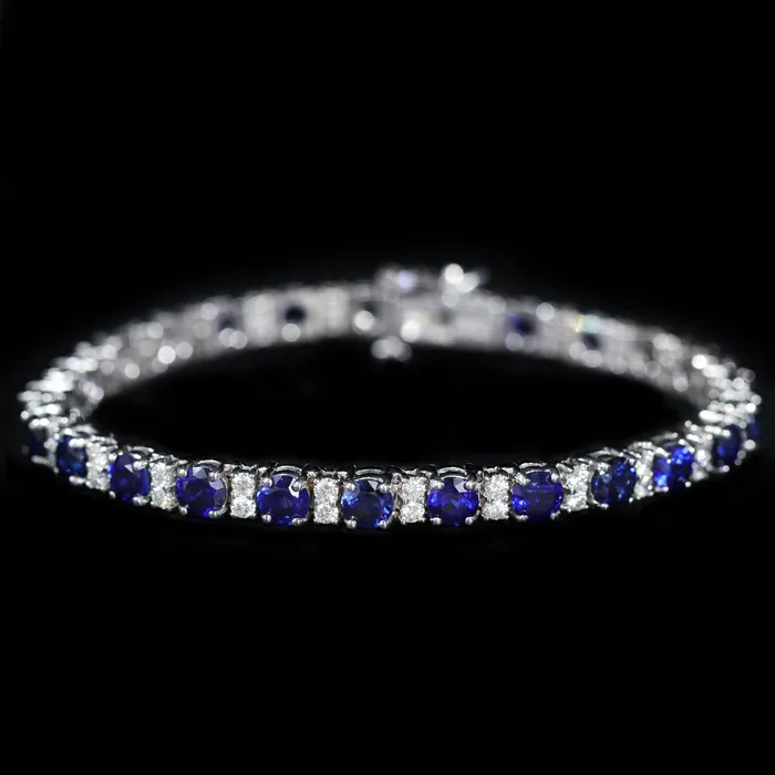 The Gem House Bracelets 14K White Gold 1140 CTW Sapphire and Diamond Bangle Bracelet